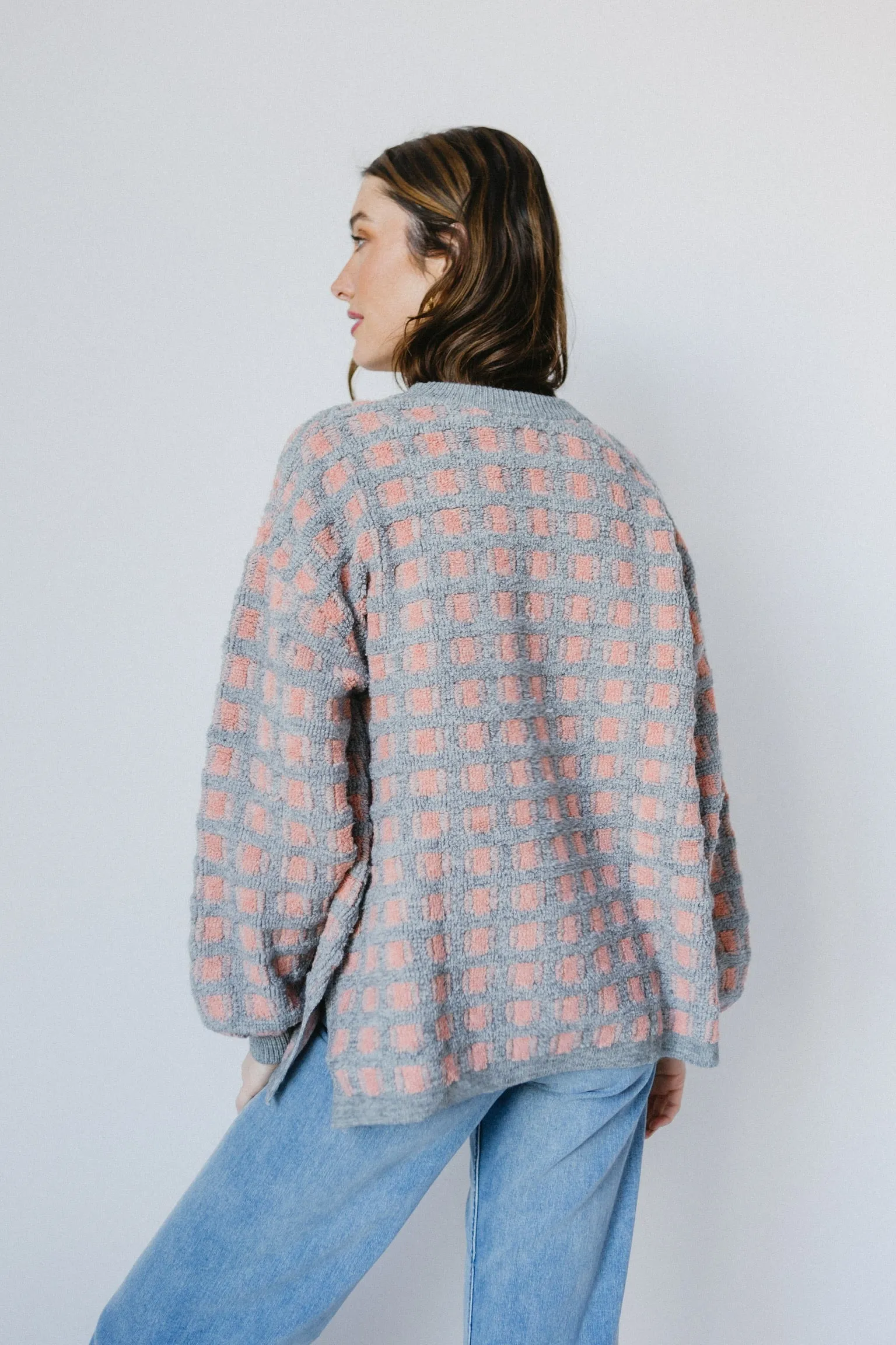 At Odds Sweater